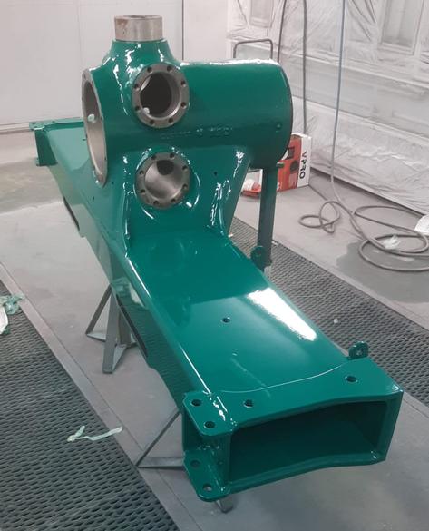 Vihre&auml;ksi maalattu puutavarakoneen osa maalauksen j&auml;lkeen, esimerkkin&auml; Automaalaamo Laitisen ty&ouml;konemaalauksista.